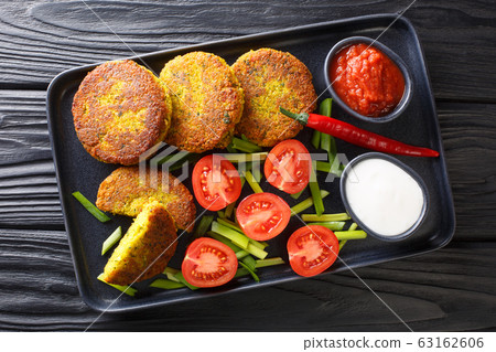 Yellow split pea fritters with fresh vegetables Yellow split pea fritters with fresh vegetables 63162606