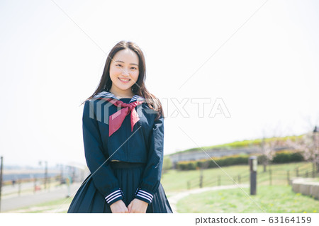 School girls with a smile School girls with a smile 63164159
