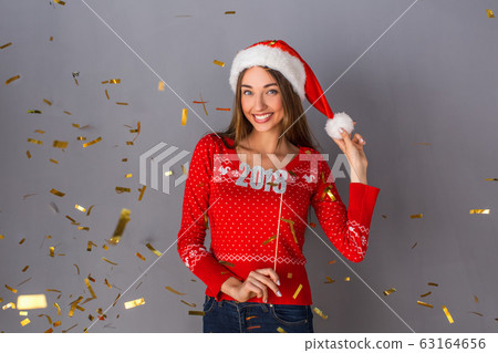 Young person studio isolated on grey wall 63164656