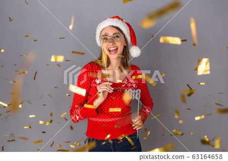 Young person studio isolated on grey wall 63164658