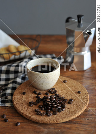 Moka pot coffee maker and coffee cup, steel Moka pot coffee maker and coffee cup, steel 63165785