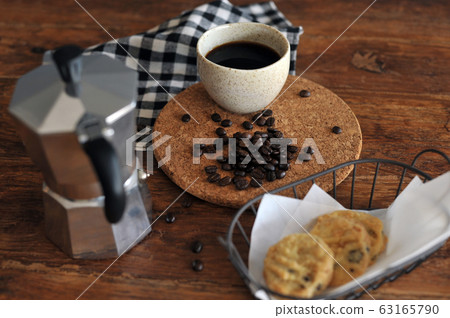 Moka pot coffee maker and coffee cup, steel Moka pot coffee maker and coffee cup, steel 63165790