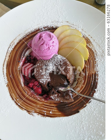 Sweet dessert with fresh slices of sweet pear. Sweet dessert with fresh slices of sweet pear. 63166278