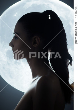 Fine Art Fashion Studio Portrait of Woman at Full Moon Fine Art Fashion Studio Portrait of Woman at Full Moon 63167000