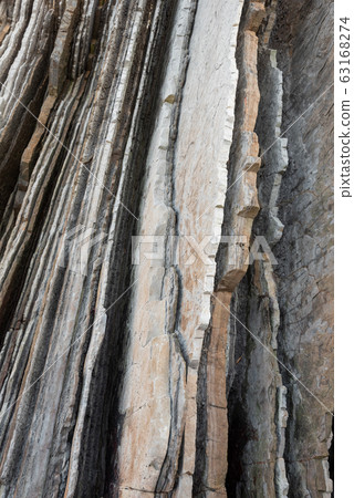 Rock strata, geological texture background detail in Zumaia, Basque Country, Spain. 63168274