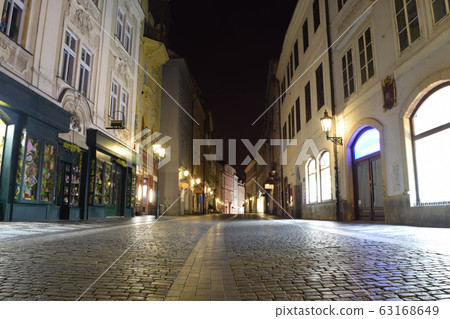 Cityscape of Prague historic center at night in Czech Republic Cityscape of Prague historic center at night in Czech Republic 63168649