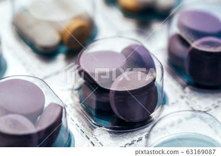 Pills in blisters for every day of the week for the morning, day, night time. Medications for patients in a hospital 63169087