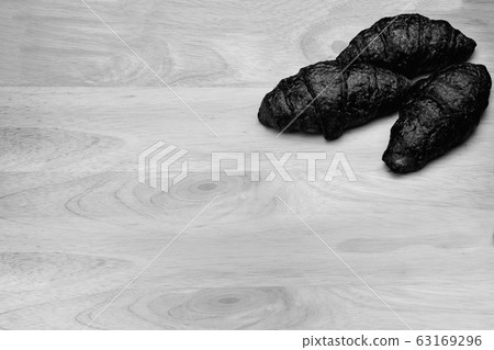 croissant placed on wood croissant placed on wood 63169296