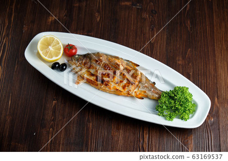 Baked dorado . catering menu 63169537