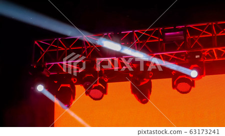 Colorful bright concert lighting equipment for stage at nightclub Colorful bright concert lighting equipment for stage at nightclub 63173241