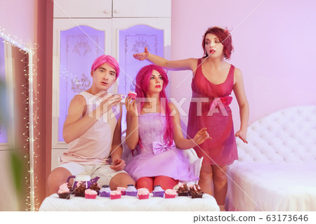 Beautiful doll people eat cupcakes. Beautiful doll people eat cupcakes. 63173646