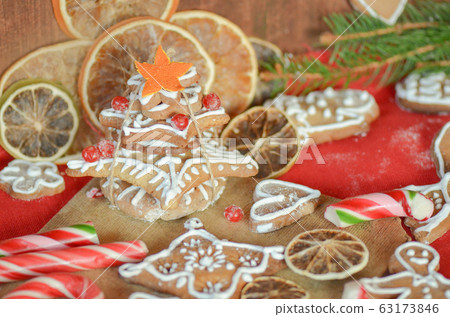 Gingerbread cookies, dried oranges, spices and Gingerbread cookies, dried oranges, spices and 63173846