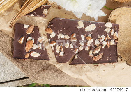 Chocolate with nuts 63174047