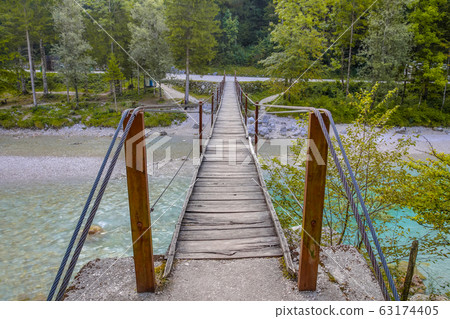 Swingbridge over Soca river near Bovec 63174405