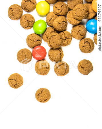 Throw of pepernoten cookies and sweets 63174407