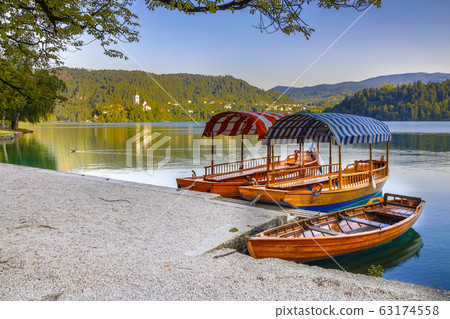 Traditional Pletna boats on lake Bled in Slovenia Traditional Pletna boats on lake Bled in Slovenia 63174558