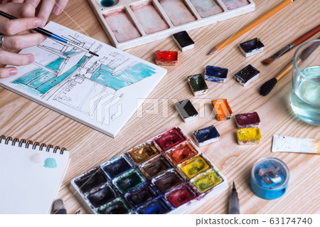 designer makes a sketch of the kitchen interier 63174740