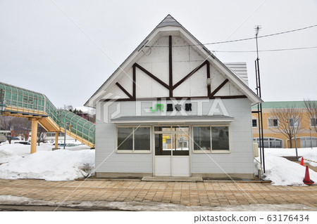 Shooting scenery of JR Kobu Station in Rankoshi-cho, Hokkaido in early spring 63176434