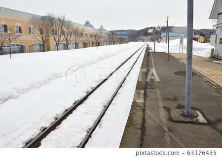 Shooting scenery of JR Kobu Station in Rankoshi-cho, Hokkaido in early spring 63176435