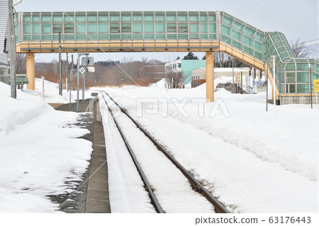 Shooting scenery of JR Kobu Station in Rankoshi-cho, Hokkaido in early spring 63176443