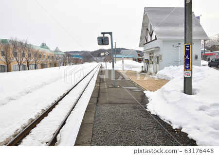 Shooting scenery of JR Kobu Station in Rankoshi-cho, Hokkaido in early spring 63176448