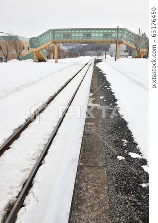 Shooting scenery of JR Kobu Station in Rankoshi-cho, Hokkaido in early spring 63176450