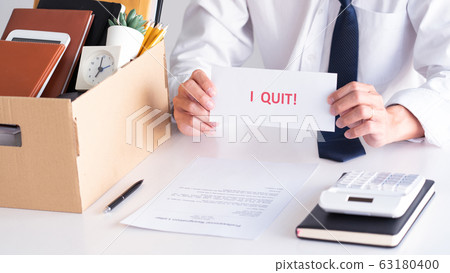 Businessman holding with I quit words card letter, Businessman holding with I quit words card letter, 63180400