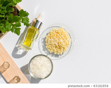 Chemicals for beauty care arranged in natural form in a white background. (Top View) 63182858