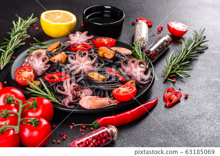 Black seafood pasta with shrimp and octopus Black seafood pasta with shrimp and octopus 63185069