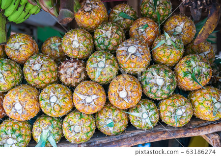 Pineapple stack at grocery 63186274