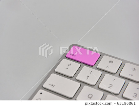 Part of a keyboard with purple esc button Part of a keyboard with purple esc button 63186861