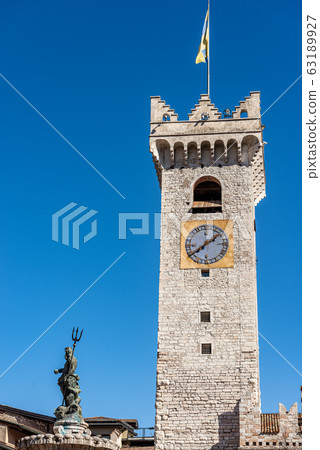 Civic medieval tower and bronze statue of Neptune - Trento Italy Civic medieval tower and bronze statue of Neptune - Trento Italy 63189927
