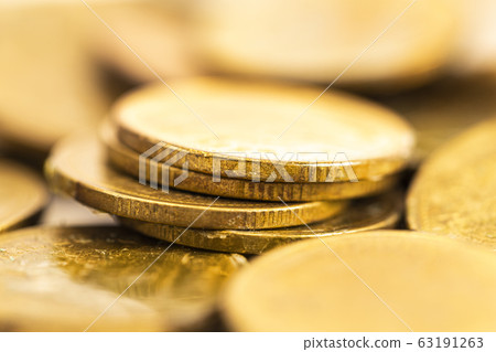 Close up of antique aged golden coin with history Close up of antique aged golden coin with history 63191263