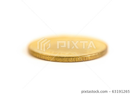 Close up of antique aged golden coin with fine 63191265