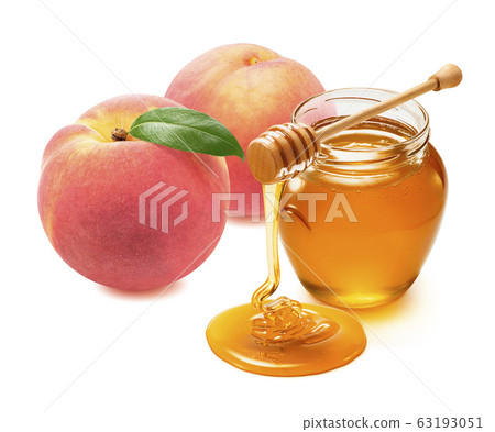 Fresh peach and honey jar with wooden dip isolated on white background 63193051
