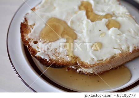 Natural yeast bread toast with maple butter 63196777