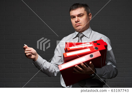 Very busy businessman closeup portrait, posing 63197743
