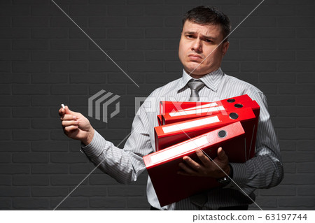 Very busy businessman closeup portrait, posing 63197744