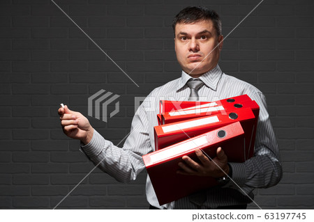 Very busy businessman closeup portrait, posing 63197745