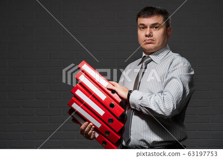 Very busy businessman closeup portrait, posing 63197753