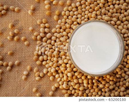 soy milk and soybean on the sack background soy milk and soybean on the sack background 63200180