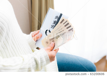 Koden A woman preparing 50,000 yen Gyozen Copy space Koden A woman preparing 50,000 yen Gyozen Copy space 63200606
