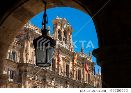 View of the beautiful antique buildings around Plaza Mayor in Salamanca old city  63200933