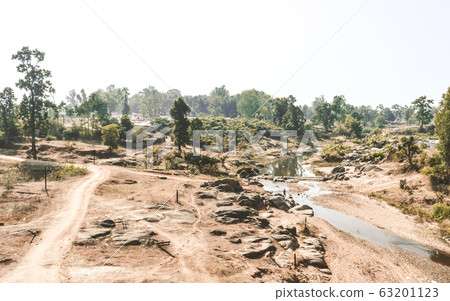 Dying rivers of a Narmada tributary in Madhya Pradesh on a scorching hot April afternoon. Dying rivers of a Narmada tributary in Madhya Pradesh on a scorching hot April afternoon. 63201123