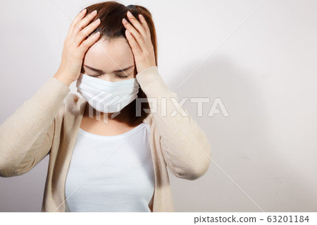Woman wearing face mask protect filter pm2.5 anti pollution on white background 63201184