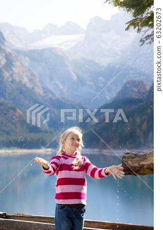beautiful mountain lake and girl beautiful mountain lake and girl 63202673