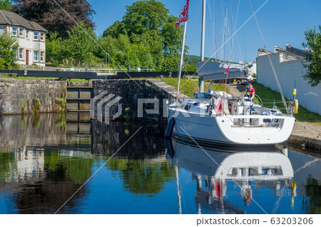 Sailing yacht waiting for gate opening Sailing yacht waiting for gate opening 63203206