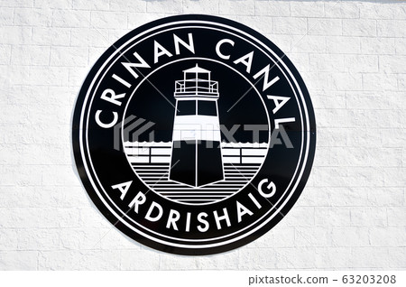 Crinan Canal welcome sign. Water channel in Scotland. Crinan Canal welcome sign. Water channel in Scotland. 63203208