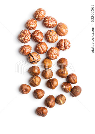 Hazelnuts with sugar icing. Hazelnuts with sugar icing. 63203565