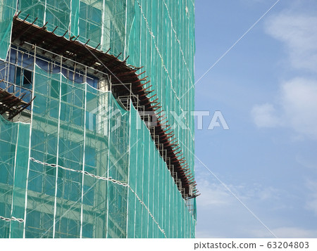 Catch platform or other construction projection from the face of a building. It is protect individuals and property from falling debris during construction.  63204803